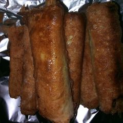 A picture of Bread rolls with scramble egg fillings.