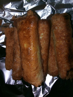 A picture of Bread rolls with scramble egg fillings.