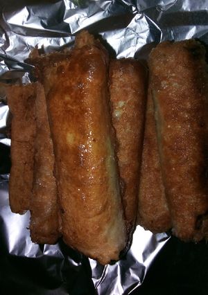 A picture of Bread rolls with scramble egg fillings.