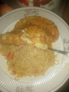 A picture of Indomie with fried egg.