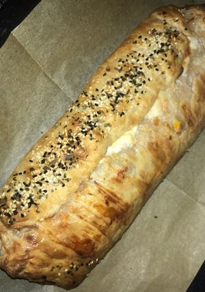 صورة لوصفة لفة بيتزا بجبنة بوك