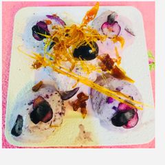A picture of Black berry Natural Ice-Cream with caramelized  Spun-Sugar.