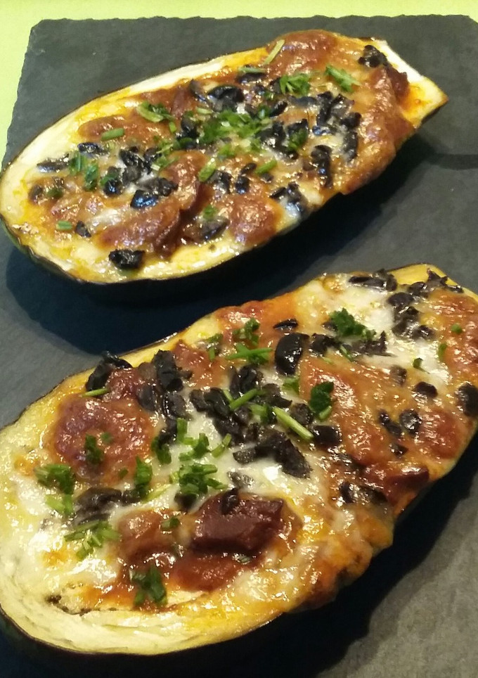 Una foto de Berenjenas rellenas de calamares en salsa americana 