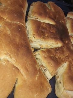Una foto de Pan casero c/chicharrón ♡