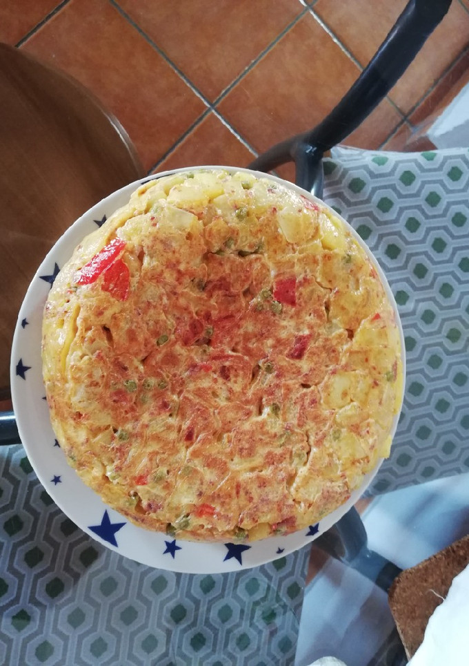 Una foto de Tortilla de papas y carne