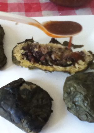 A picture of Pre-Hispanic Black Bean Tamales with Edible Leaves.