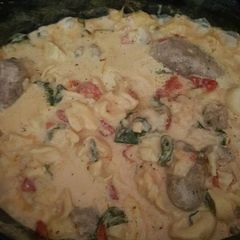 A picture of Crock pot sausage and tortellini soup.