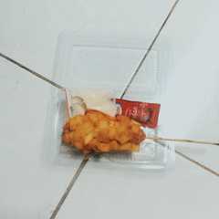 A picture of Hotang (Hotdog Kentang) / Sotang (Sosis Kentang).