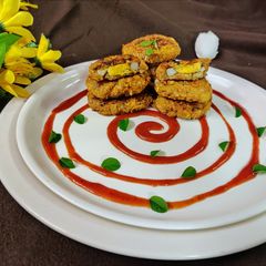 A picture of Dahi egg kebab.