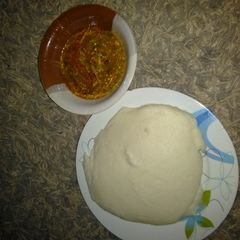 A picture of Okro soup and white amala.