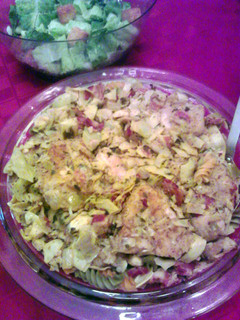 A picture of Chicken & Artichokes over pasta.