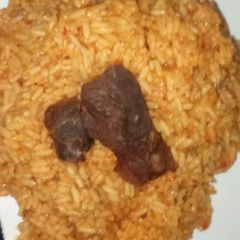 Jollof rice and meat #Ramadancontest# A picture of Jollof rice and meat #Ramadancontest#.