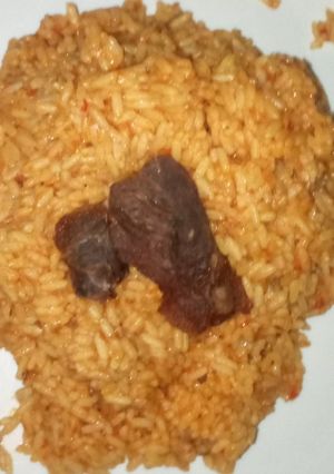 A picture of Jollof rice and meat #Ramadancontest#.