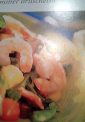 A picture of shrimp salad with warm bacon dressing.