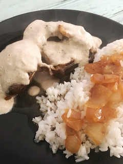 Una foto de Osobuco con salsa de setas