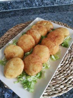 Una foto de Bocaditos de patata rellenos de sobrasada vegana