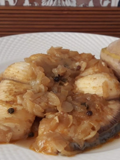 Una foto de Pescado encebollado
