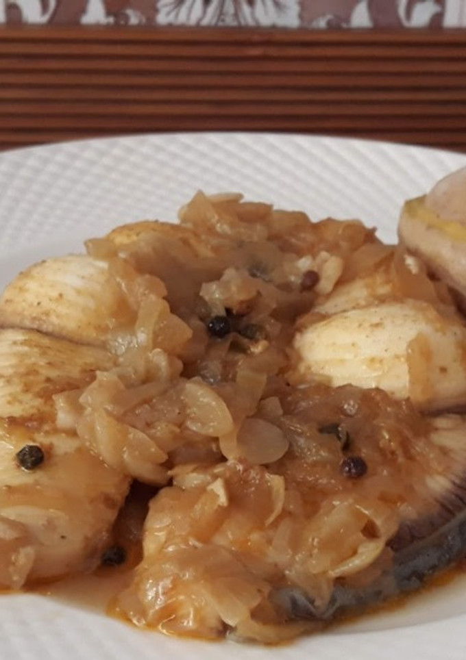 Una foto de Pescado encebollado