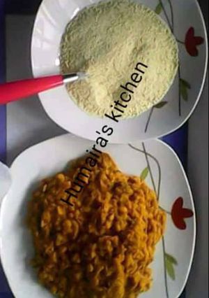 A picture of Baked beans with gari.(kwaki).