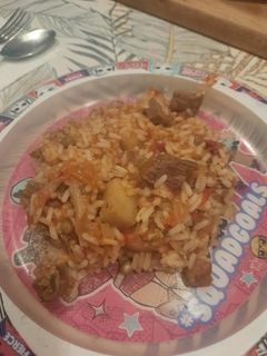 Una foto de Guiso de arroz con asado que quedo