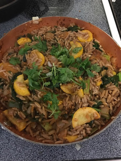 A picture of Vegan whole wheat orzo with yellow squash, spinach & jalapeños.
