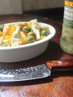 Una foto de Ensalada de naranjas y alcachofas