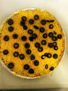 A picture of 7 layer taco dip.