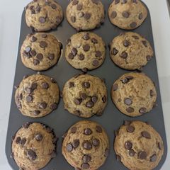 A picture of Bakery-Style Banana Chocolate Chip Muffins.