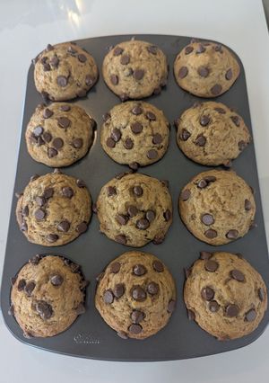 A picture of Bakery-Style Banana Chocolate Chip Muffins.
