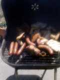 grilled hot dogs wrapped in hamburger and bacon