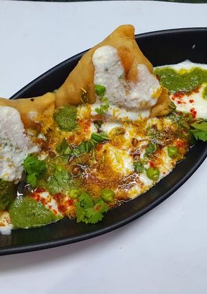 A picture of Dahi Samosa Chaat.