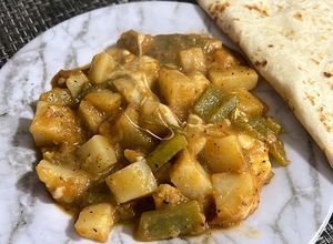 Una foto de Papas con rajas y queso