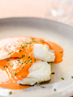 Una foto de Bacalao en salsa de pimientos del piquillo