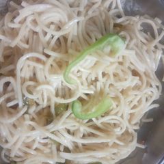 A picture of Hakka noodles in microwave.