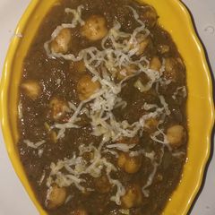 A picture of Palaak shola (green vegetable with chickpeas).