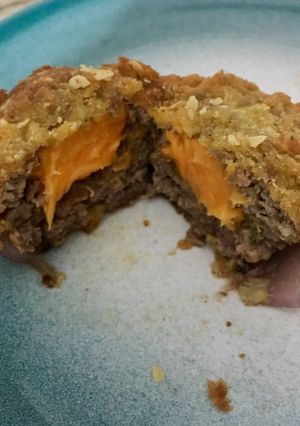 Una foto de Hamburguesas con cebolla y queso cheddar
