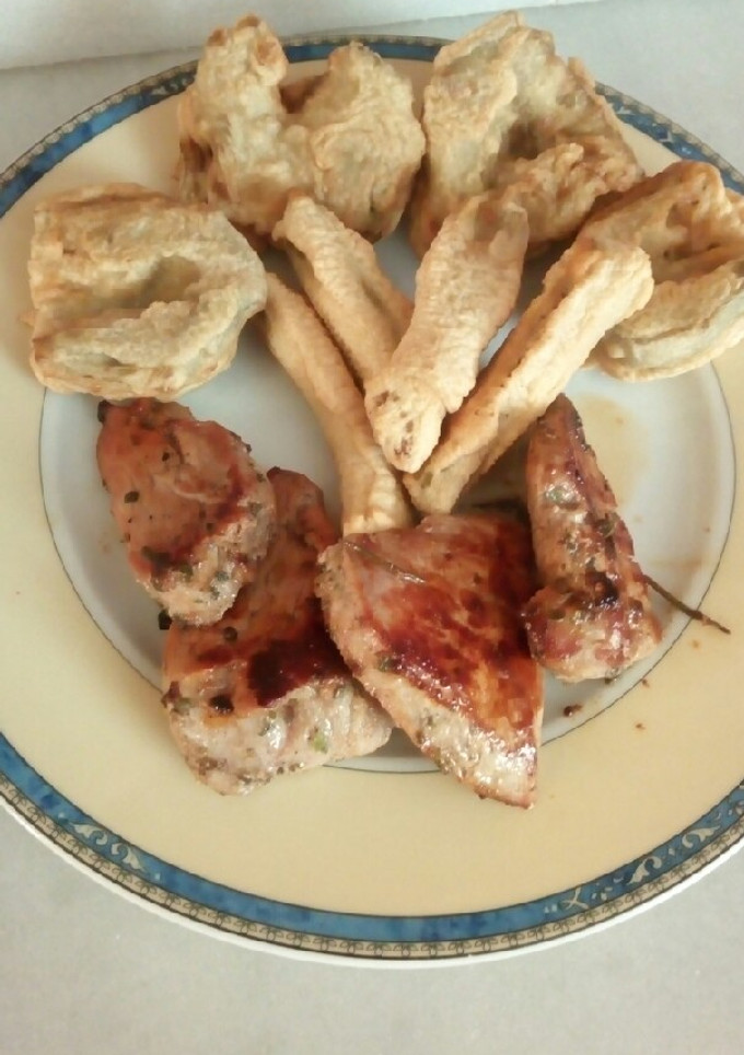 Una foto de Solomillo de cerdo marinado con brandy