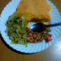 A picture of Mashed Potatoes,hot chilli cabbage and scrambled spanish omelet.