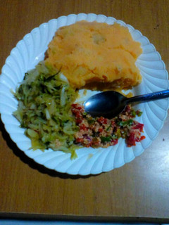 A picture of Mashed Potatoes,hot chilli cabbage and scrambled spanish omelet.