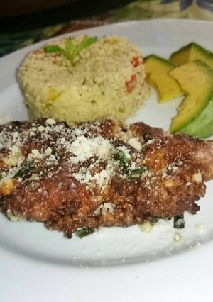 Una foto de Pollo a la parmesana