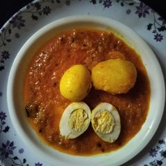 A picture of Boiled egg masala curry.