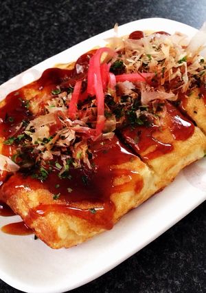 A picture of Takoyaki Made in a Tamagoyaki Pan (Square Pan Takoyaki).