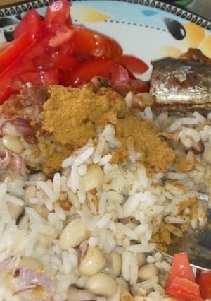 A picture of Rice &beans with fish.