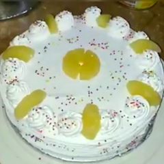 A picture of Fresh pineapple cream cake.