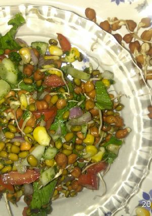 A picture of Sprouts corn salad with green chutney.