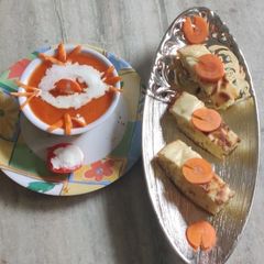 A picture of Roasted carrot soup with pav.