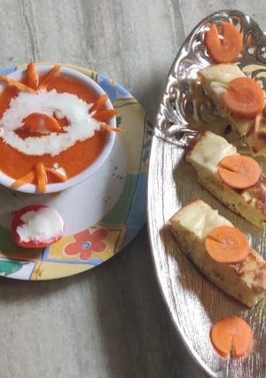 A picture of Roasted carrot soup with pav.