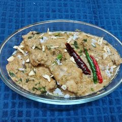A picture of Khus Masala Coconut Chicken.