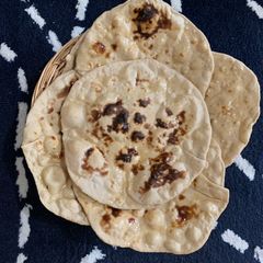 A picture of Wheat flour Tawa Plain Naan.