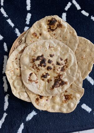 A picture of Wheat flour Tawa Plain Naan.